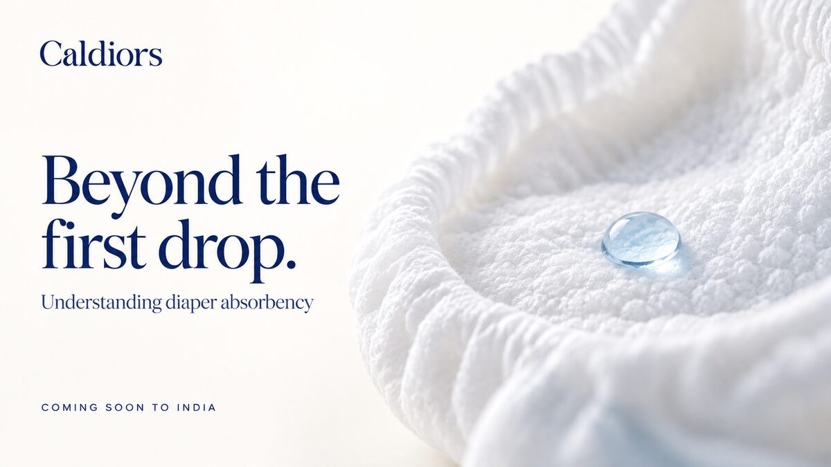 Caldiors 'Beyond the first drop' – a close-up of a single water droplet resting on the soft textured surface of a diaper