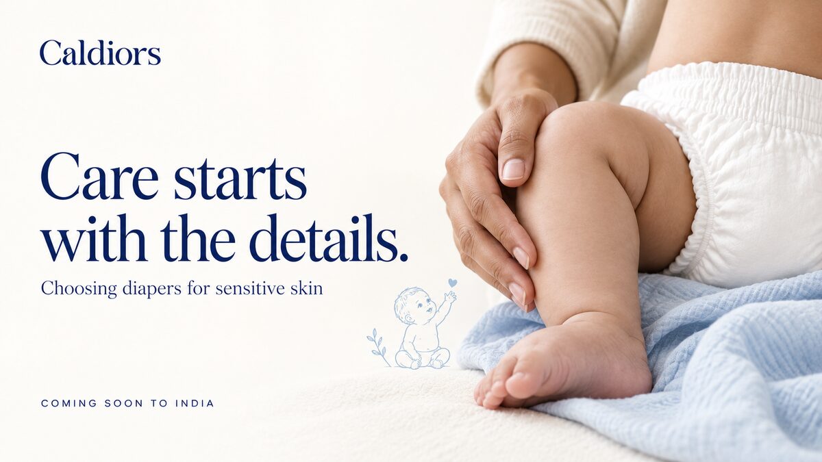 Caldiors 'Care starts with the details' – a parent gently holding a baby's leg as the baby wears a soft white diaper on a blue blanket